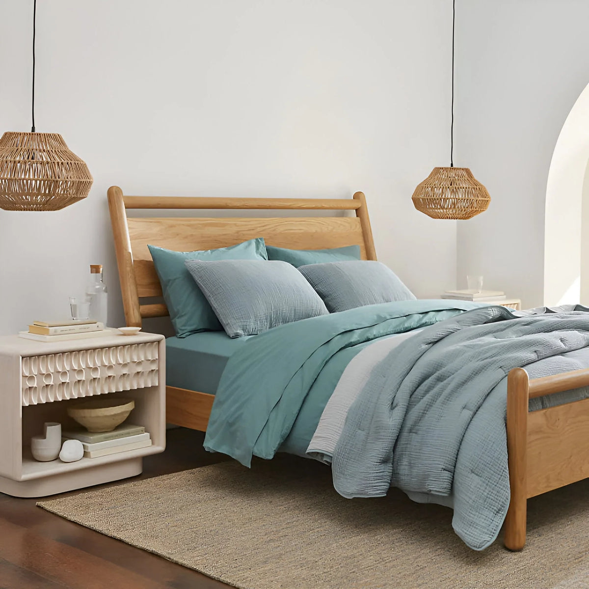 Woven rattan pendant light, a pair in a bedroom