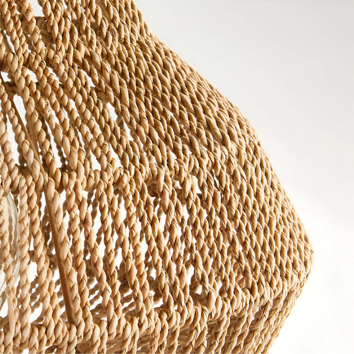 Woven rattan pendant light, close-up of the shade