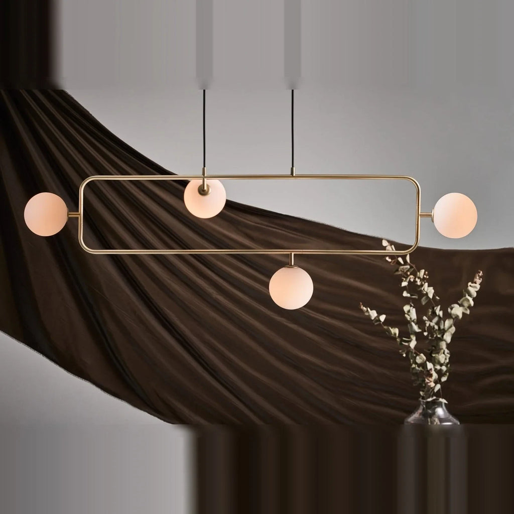 Rectangular Frame Four-Globe Linear Pendant, in champagne gold with globes turned out