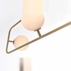 Rectangular Frame Four-Globe Linear Pendant, close-up of the globes and frame