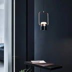 Rectangular frame LED pendant, portrait, above a desk