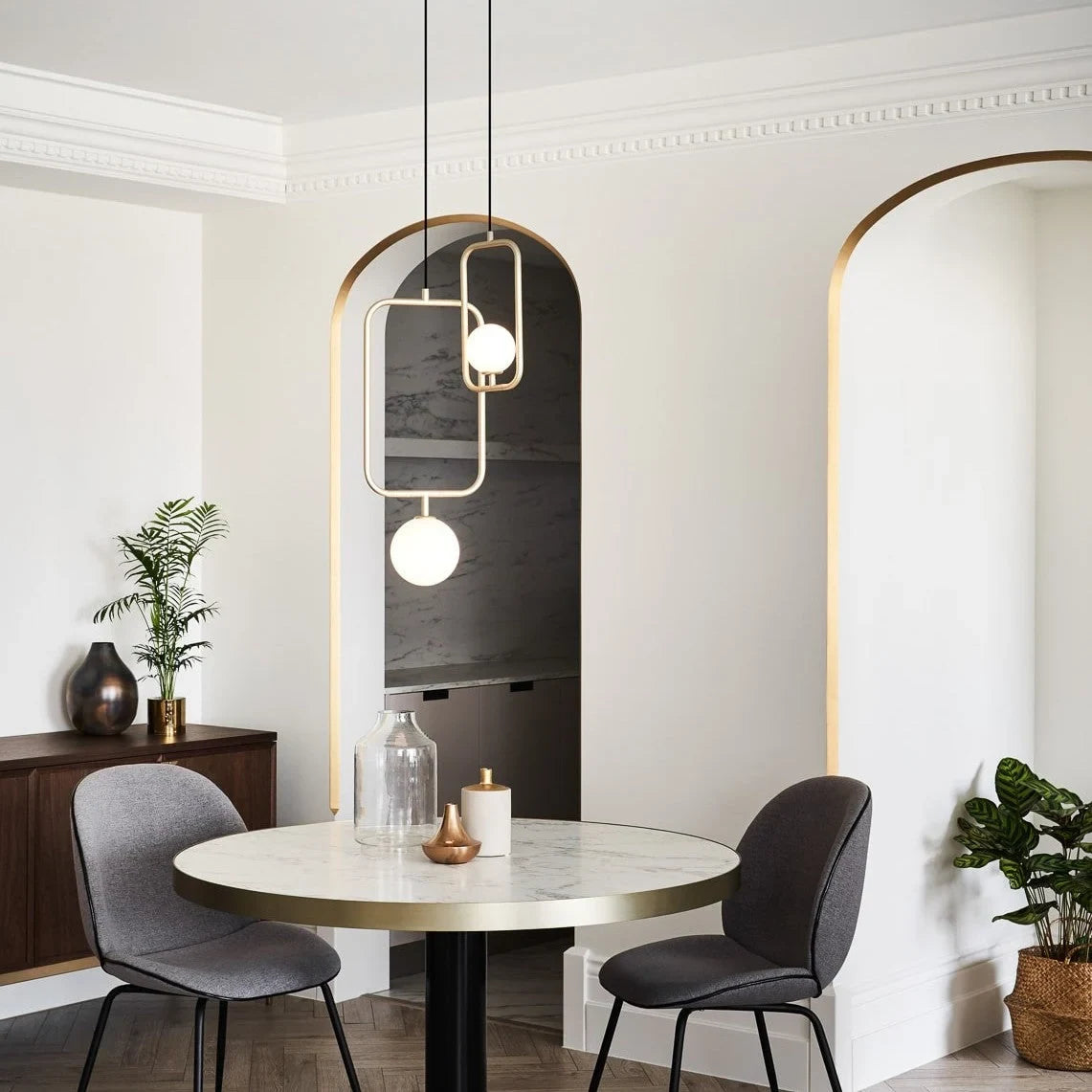 Rectangular Frame Opal Globe Pendant, above a round dining table