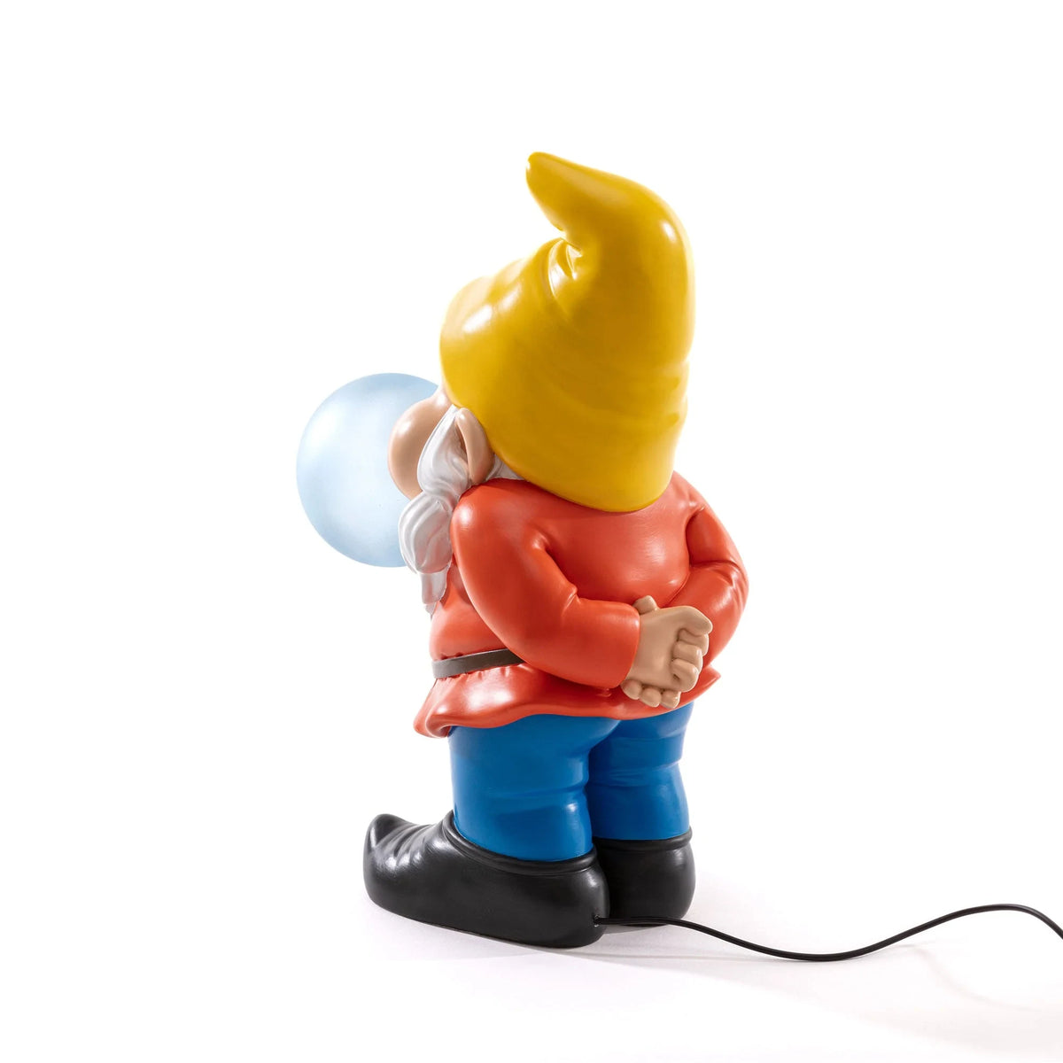 Resin dwarf table lamp blowing a glowing glass bubble, back view