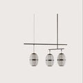 Ribbed cage three-light pendant, on a plain background