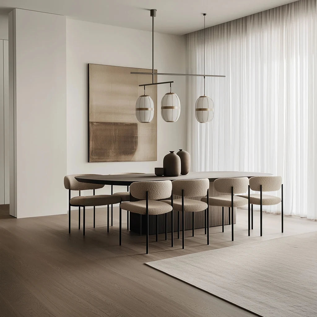 Ribbed cage three-light pendant, above a long dining table