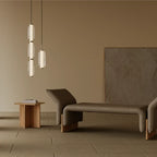 Ribbed capsule LED pendant, shown with taller stacked versions in a living room