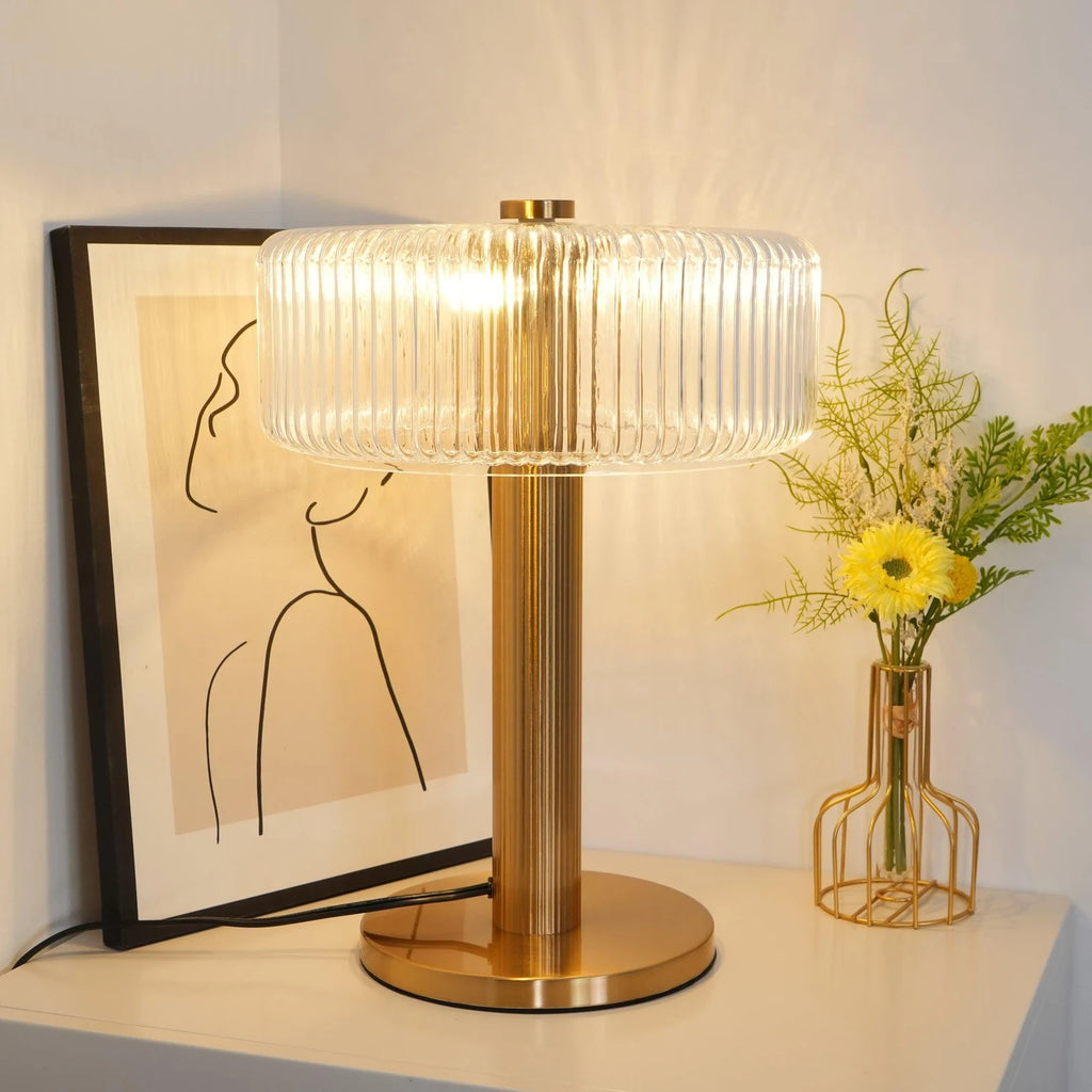Ribbed glass table lamp with gold column base
