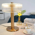 Ribbed glass table lamp with gold column base