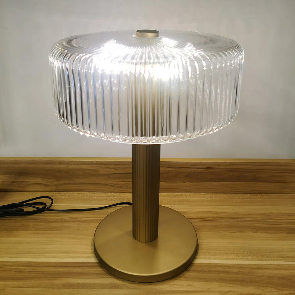 Ribbed glass table lamp with gold column base