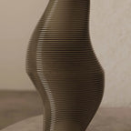 Ribbed sculptural glass table lamp, close-up of the ribbed glass