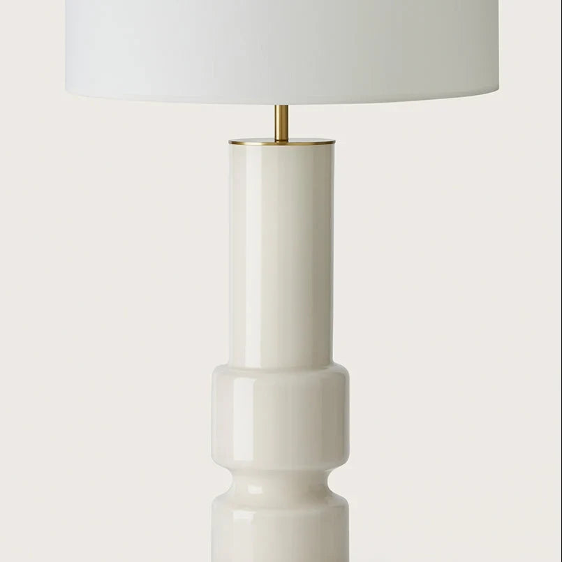 Ridged ceramic cylinder table lamp, close-up of the white body