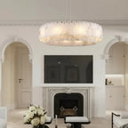 Stone-effect ring chandelier, 45cm, lit in a living room