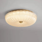 Ripple glass flush ceiling light, lit, close-up