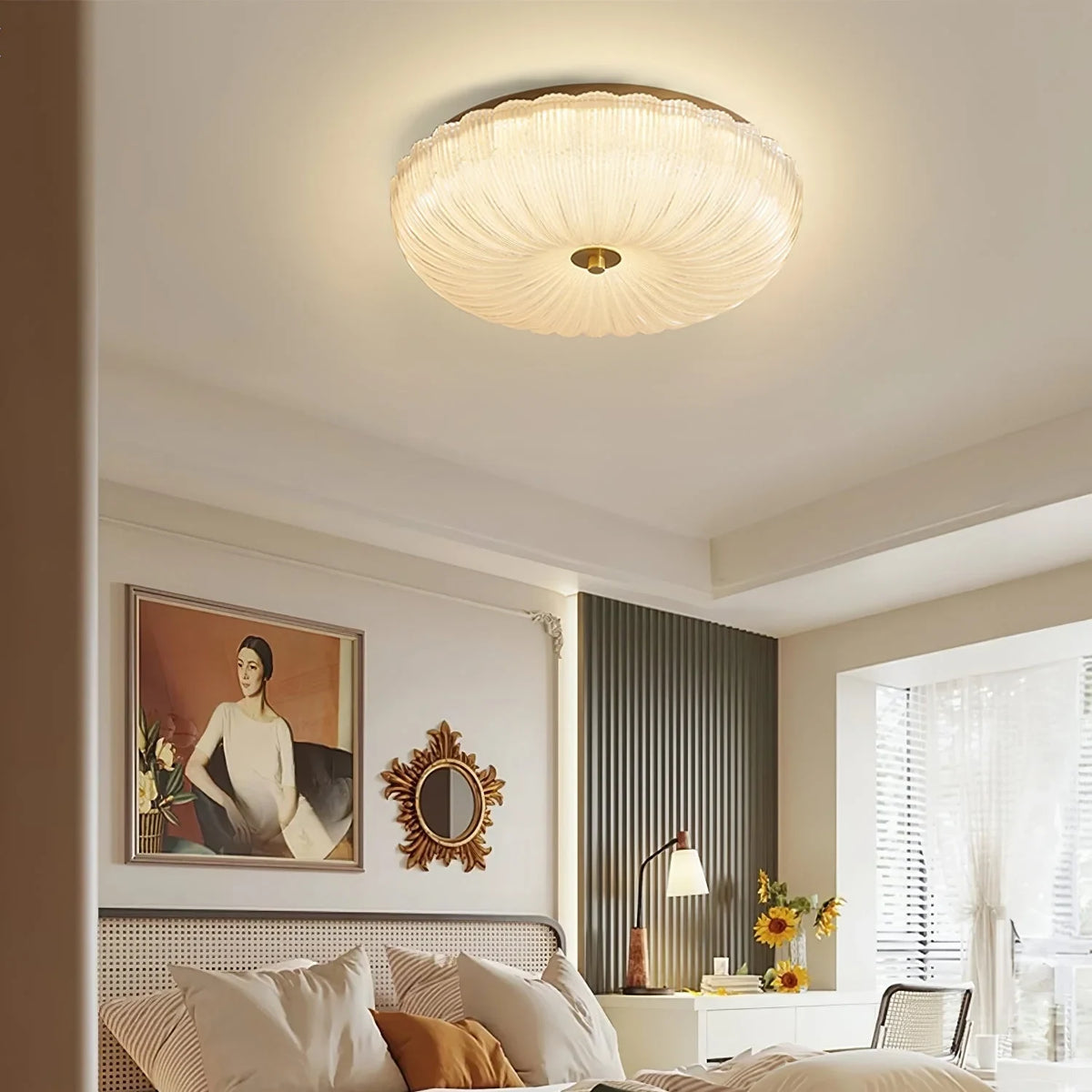 Ripple glass flush ceiling light, lit in a bedroom
