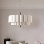 Layered ripple pendant light in white, in a room