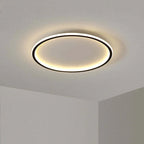 Round LED ring flush ceiling light, in black, lit