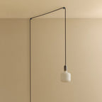 Plug-in pendant with rounded matte white bulb, graphite, unlit