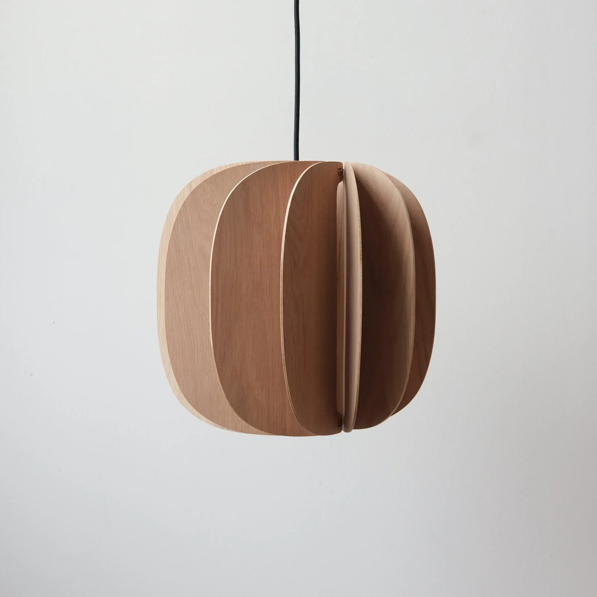 Sculptural white oak pendant, unlit