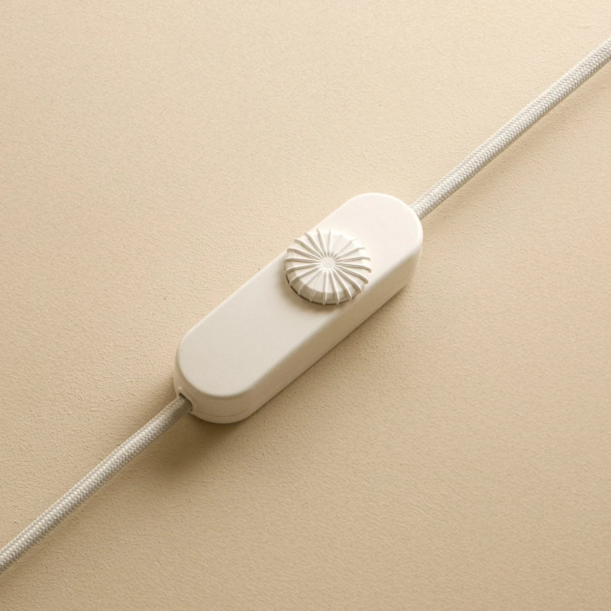 Mouth-blown glass table lamp in sea green, close-up of the in-line dimmer