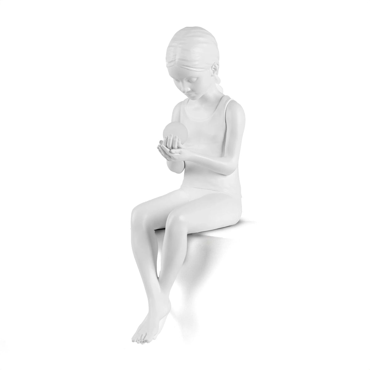 Seated girl figure table lamp in white resin, holding a glowing sphere