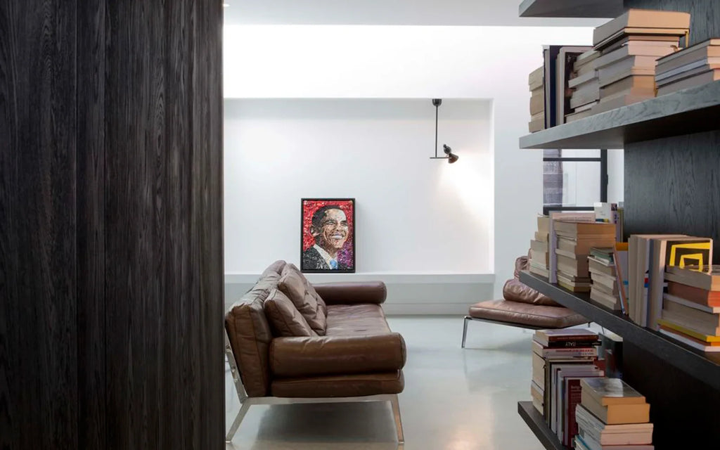 Single-bird T-bar pendant, in a living room with bookshelves