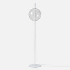 Single globe floor lamp in mouth-blown glass, in white with clear glass
