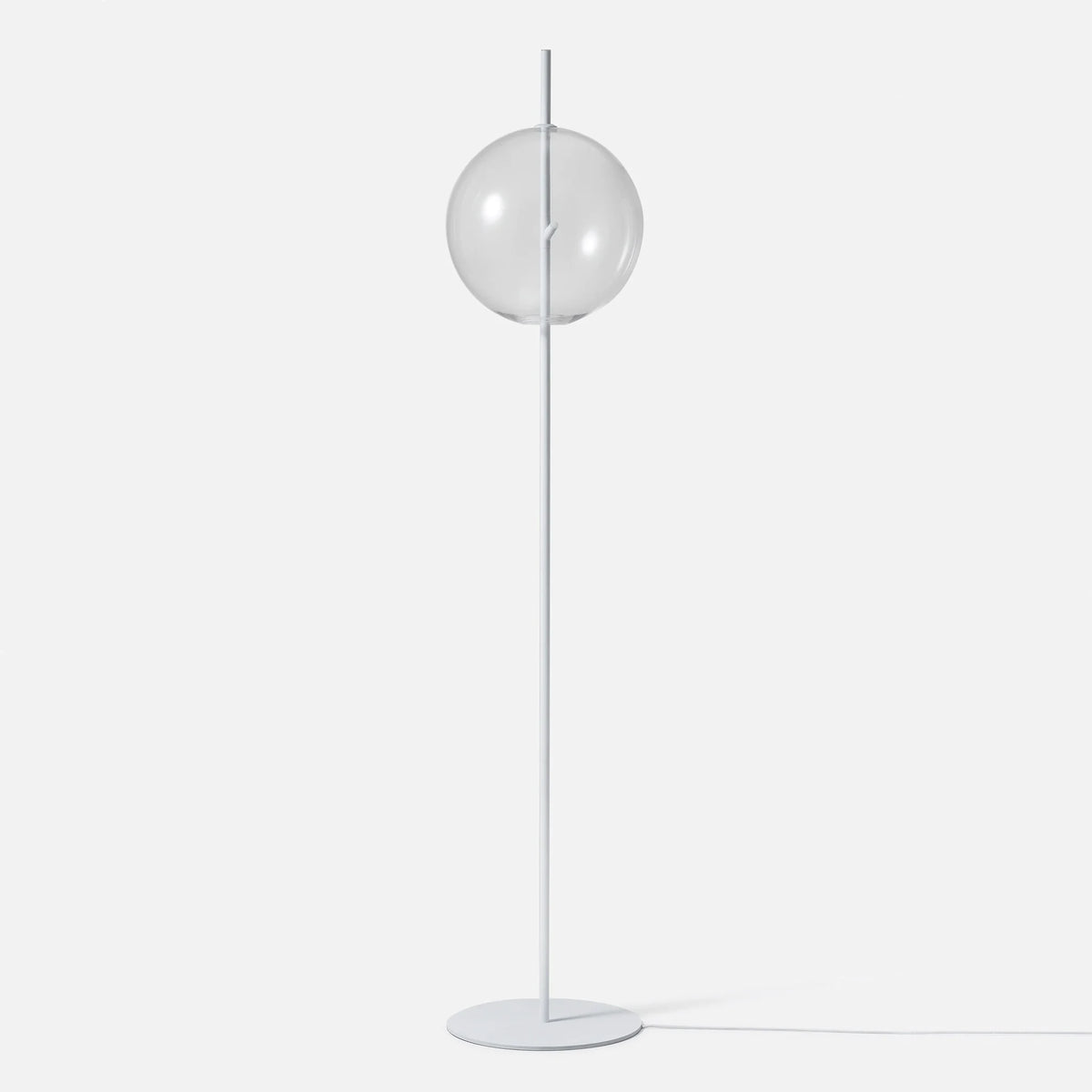 Single globe floor lamp in mouth-blown glass, in white with clear glass