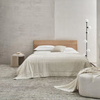 Six-globe vertical opal glass floor lamp, in black in a bedroom