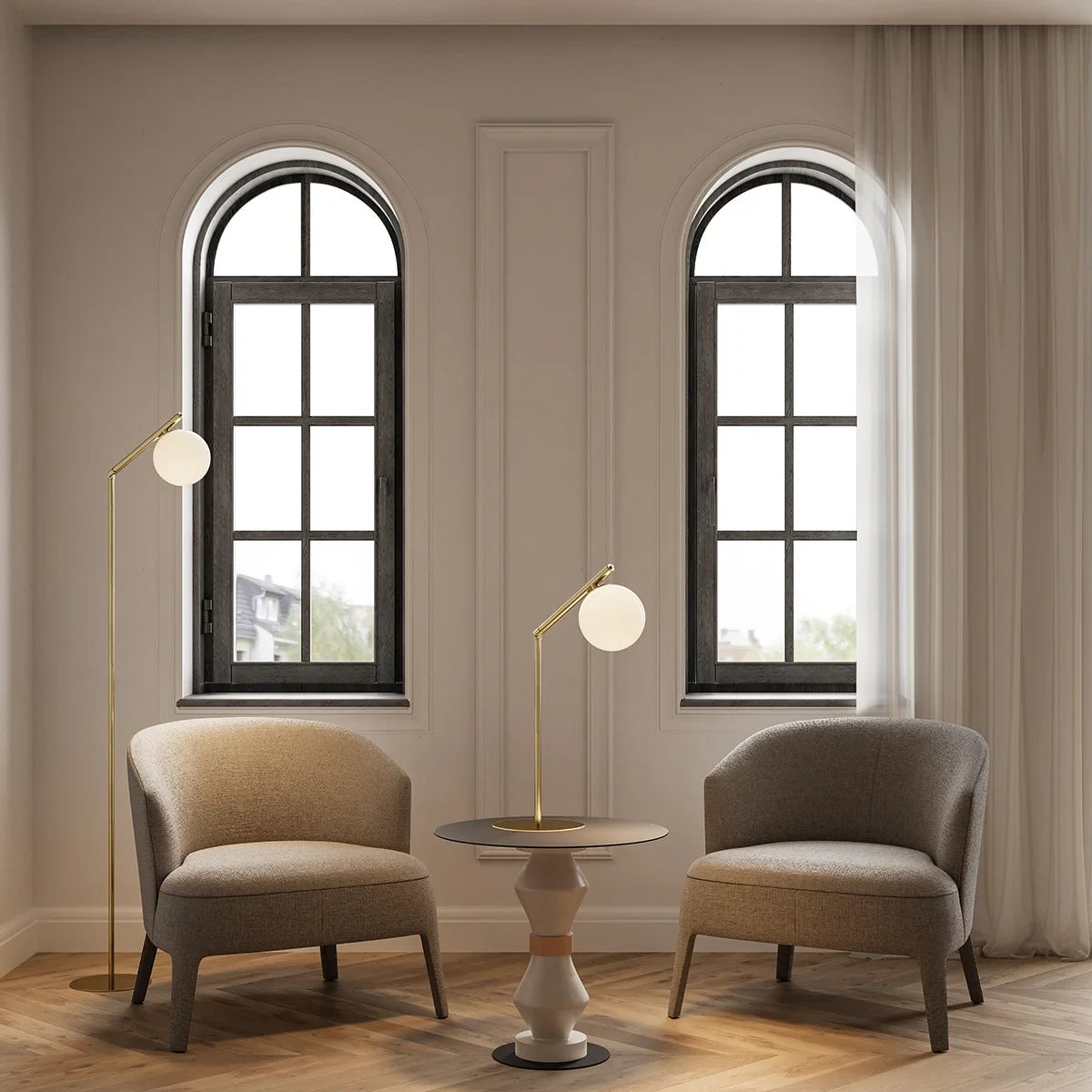 Slim articulated floor lamp with opal glass globe, matte brass, beside an armchair in a room