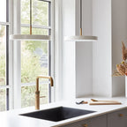 Slim disc LED pendant, 31cm, brass top, two in pearl white above a kitchen sink