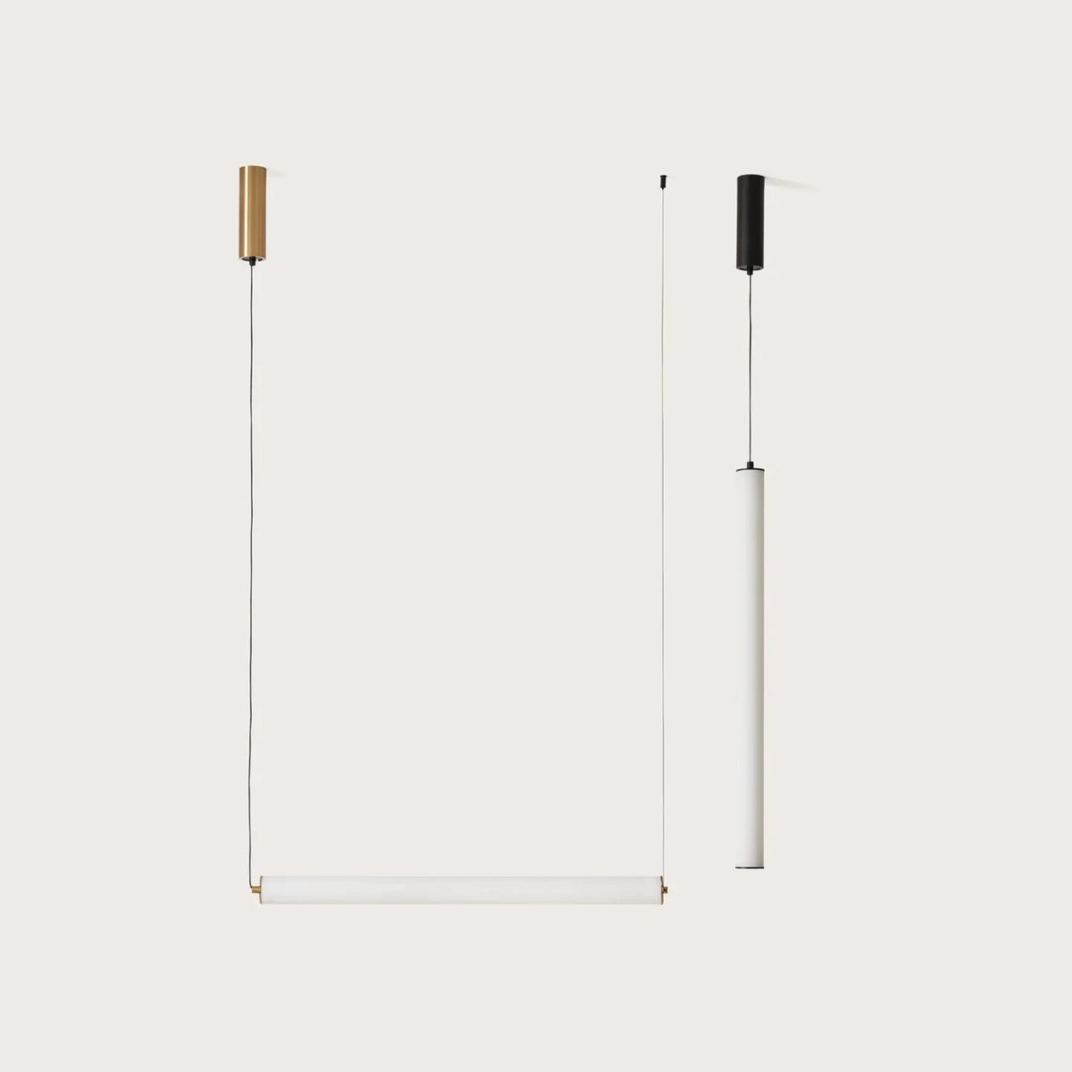 Slim linear tube LED pendant, with brass and black fittings
