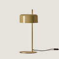 Slim stem table lamp with domed disc shade, in olive, with a brass frame