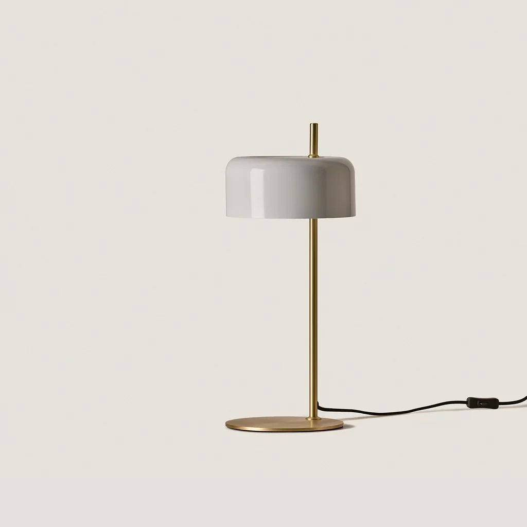 Slim stem table lamp with domed disc shade, in white, with a brass frame