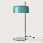 Slim stem table lamp with domed disc shade, in teal, with a chrome frame