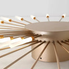 Starburst LED flush ceiling light, close-up of the gold centre