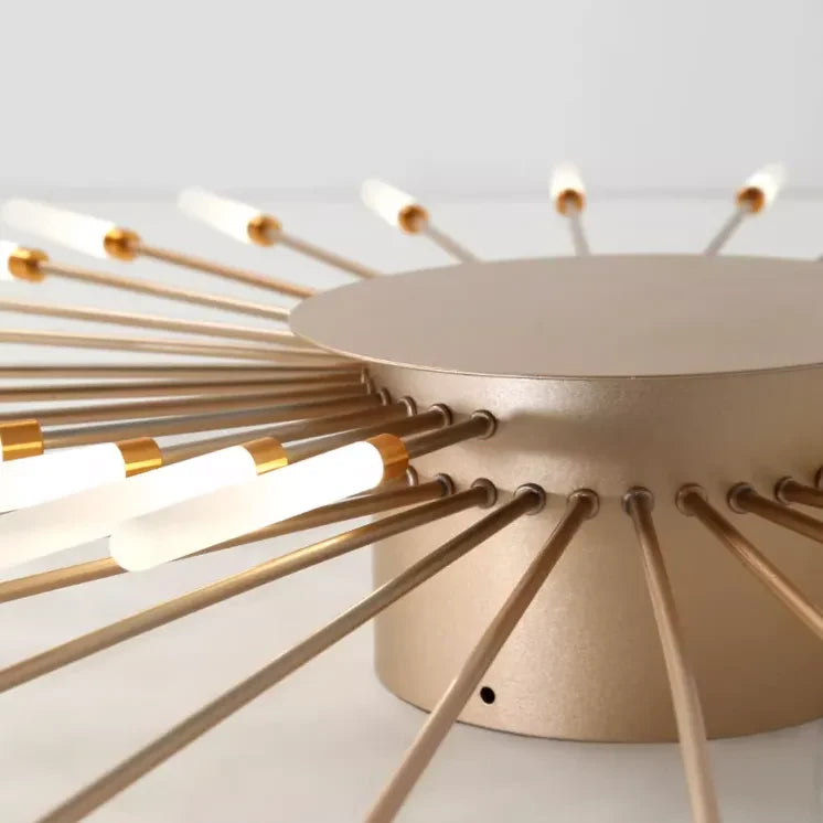 Starburst LED flush ceiling light, close-up of the gold centre
