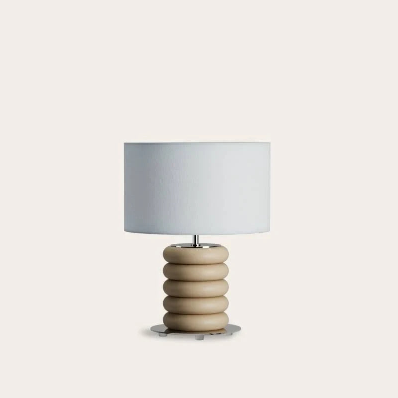 Stacked ceramic rings table lamp, in sand, with a drum shade (not included)