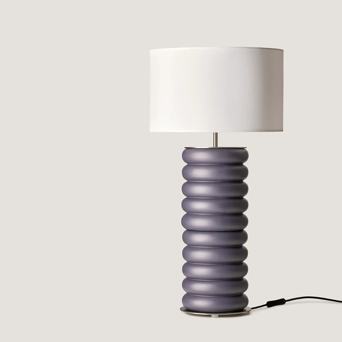 Stacked ceramic rings table lamp, in a grey-violet glaze, with a drum shade (not included)