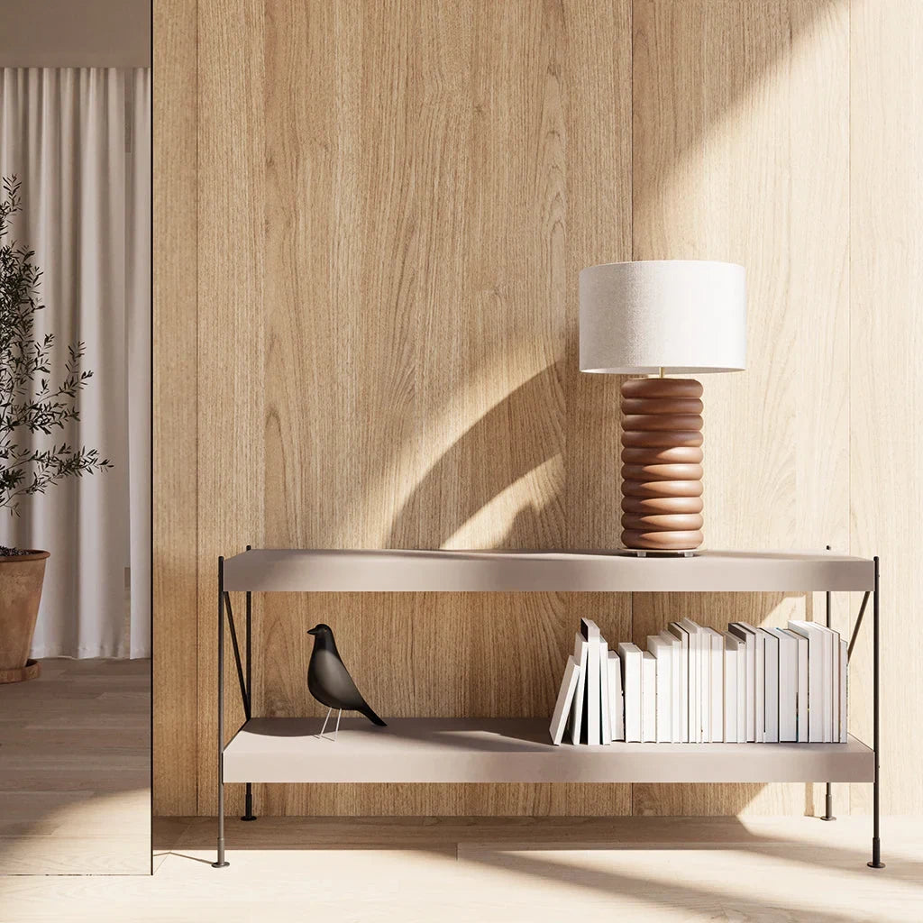 Stacked ceramic rings table lamp, on a console table, closer view
