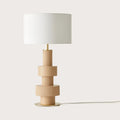 Stacked ribbed ceramic lamp, in sand, with a white drum shade (not included)