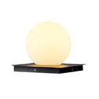Outdoor pillar light, globe shade, lit