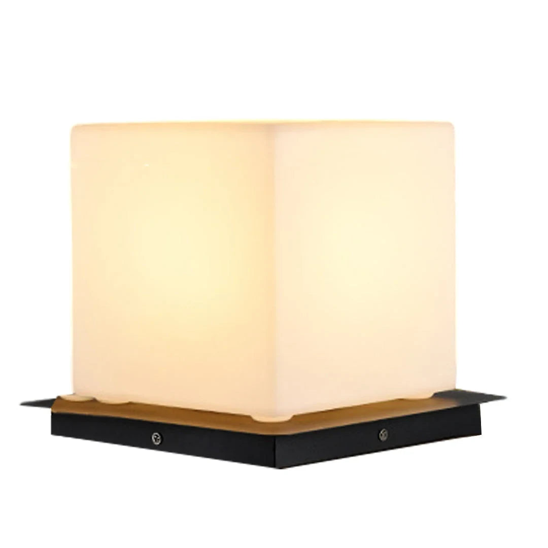Outdoor pillar light, cube shade, lit
