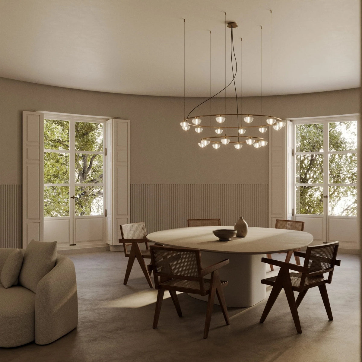Striped diffuser ring chandelier, above a round dining table