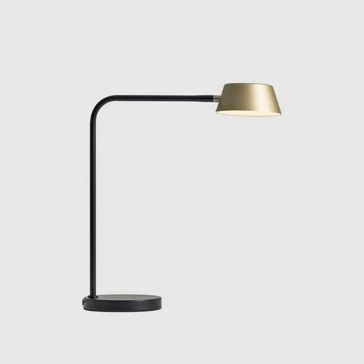 Slim desk table lamp with rotating shade, champagne gold, on a white background