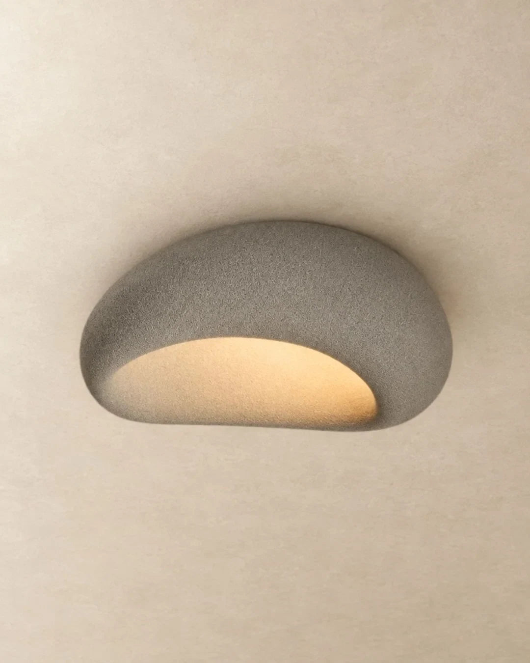 Textured pebble flush ceiling light, in grey