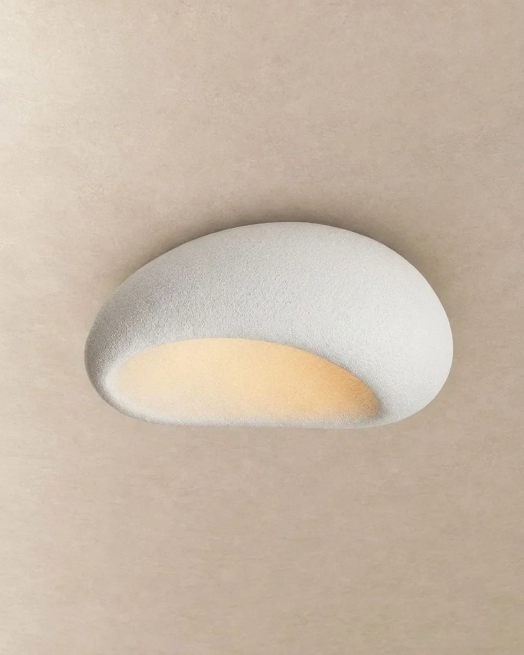 Textured pebble flush ceiling light, in white