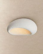 Textured pebble flush ceiling light, in white