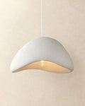 Textured sculptural pendant light, wavy shape in white