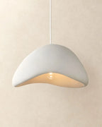 Textured sculptural pendant light, wavy shape in white