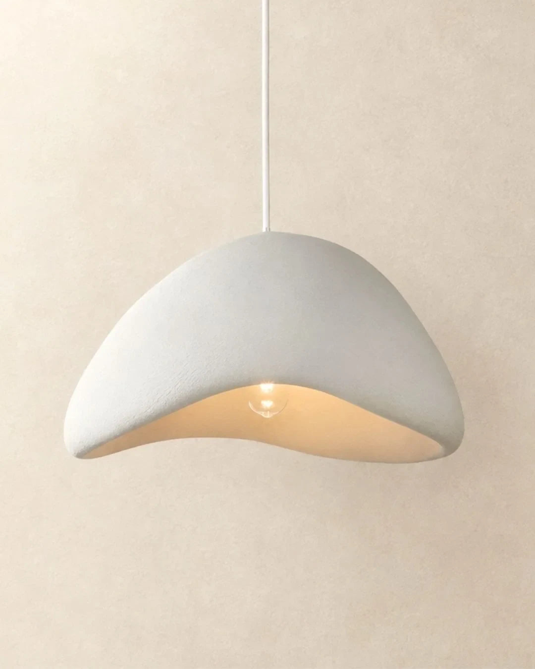 Textured sculptural pendant light, wavy shape in white